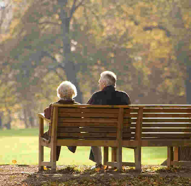 senior-couple-on-bench-retirement-life